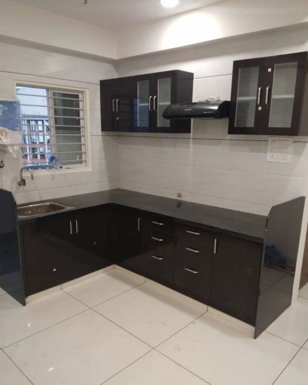 Sleek minimalist glossy kitchen design Bharatpur